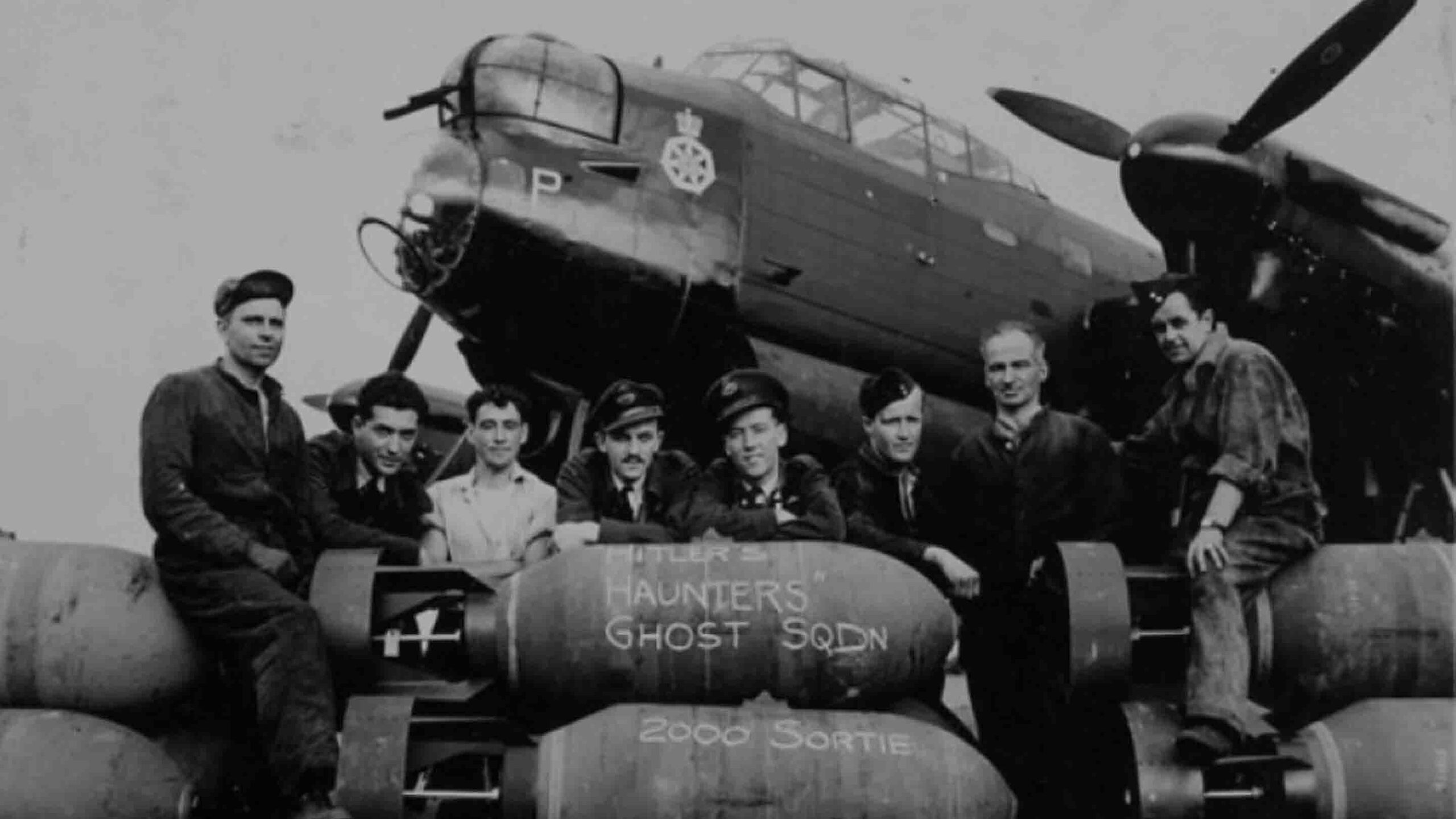 No. 428 (Ghost) Squadron, RCAF, with Avro Lancaster B.X "P-Peter" after completing the squadron’s 2,000th sortie, Bremen raid, August 18, 1944.
