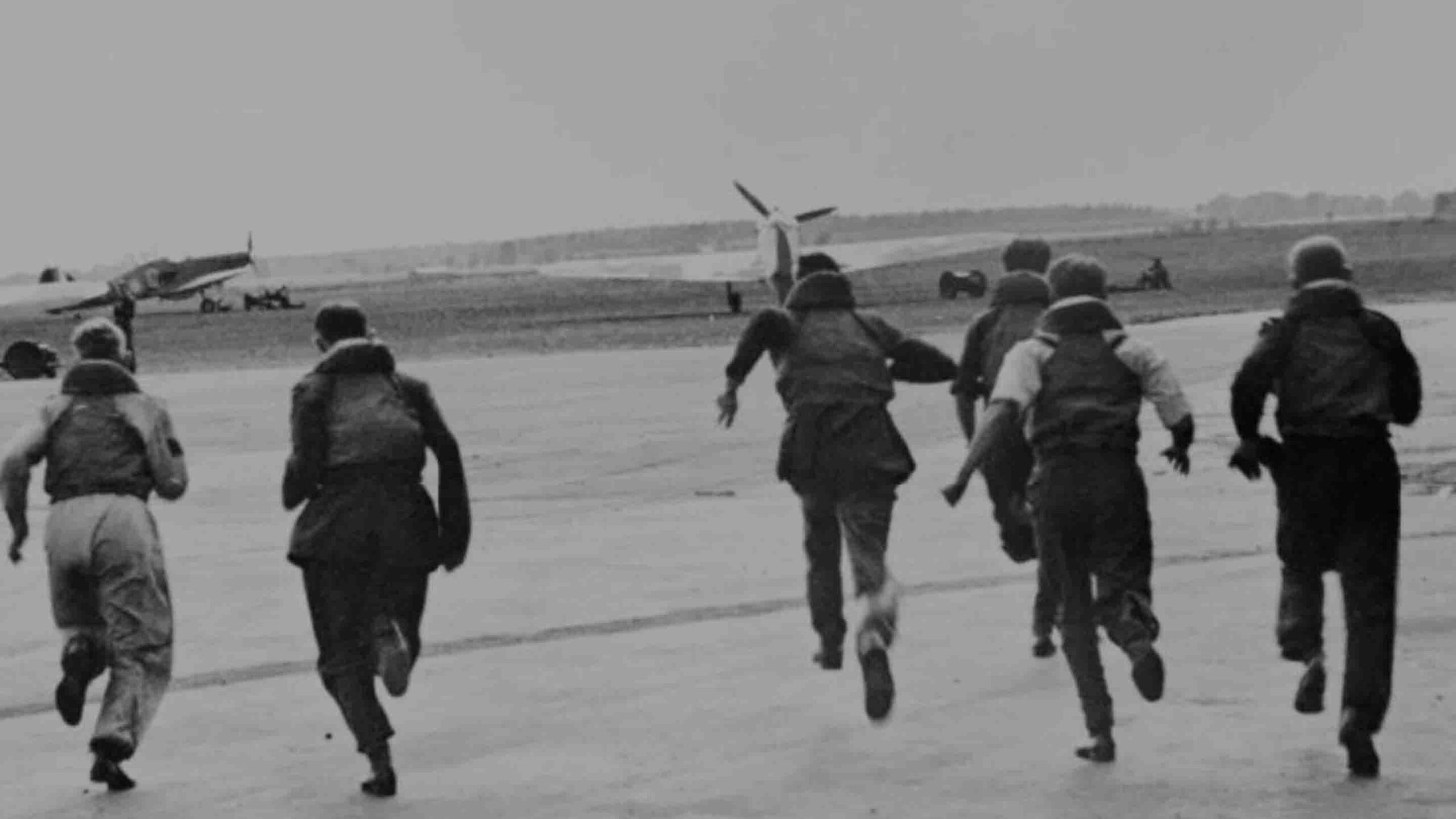 RAF pilots sprint to their aircraft during the Battle of Britain, 25 July 1940.