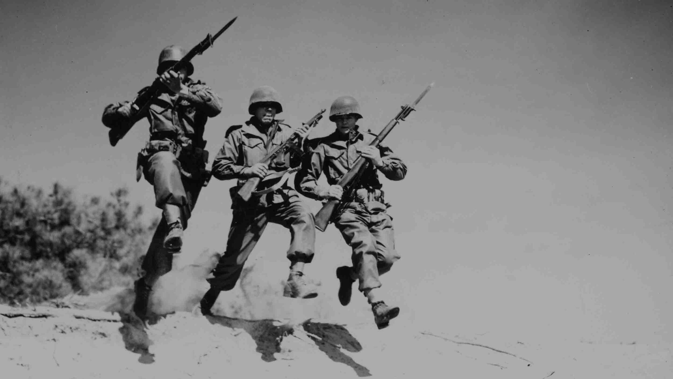 Soldiers of Company G, 2nd Battalion, 30th Infantry Regiment, 3rd Infantry Division advance at the Anzio Beachhead, Italy, 2 April 1944.