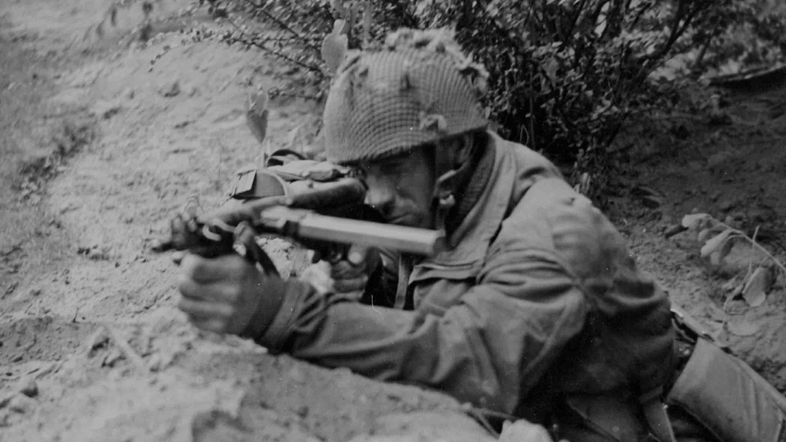 Private J. Connington of Selby, Yorkshire, in action with his Sten gun, 20 September 1944, during Operation Market Garden.