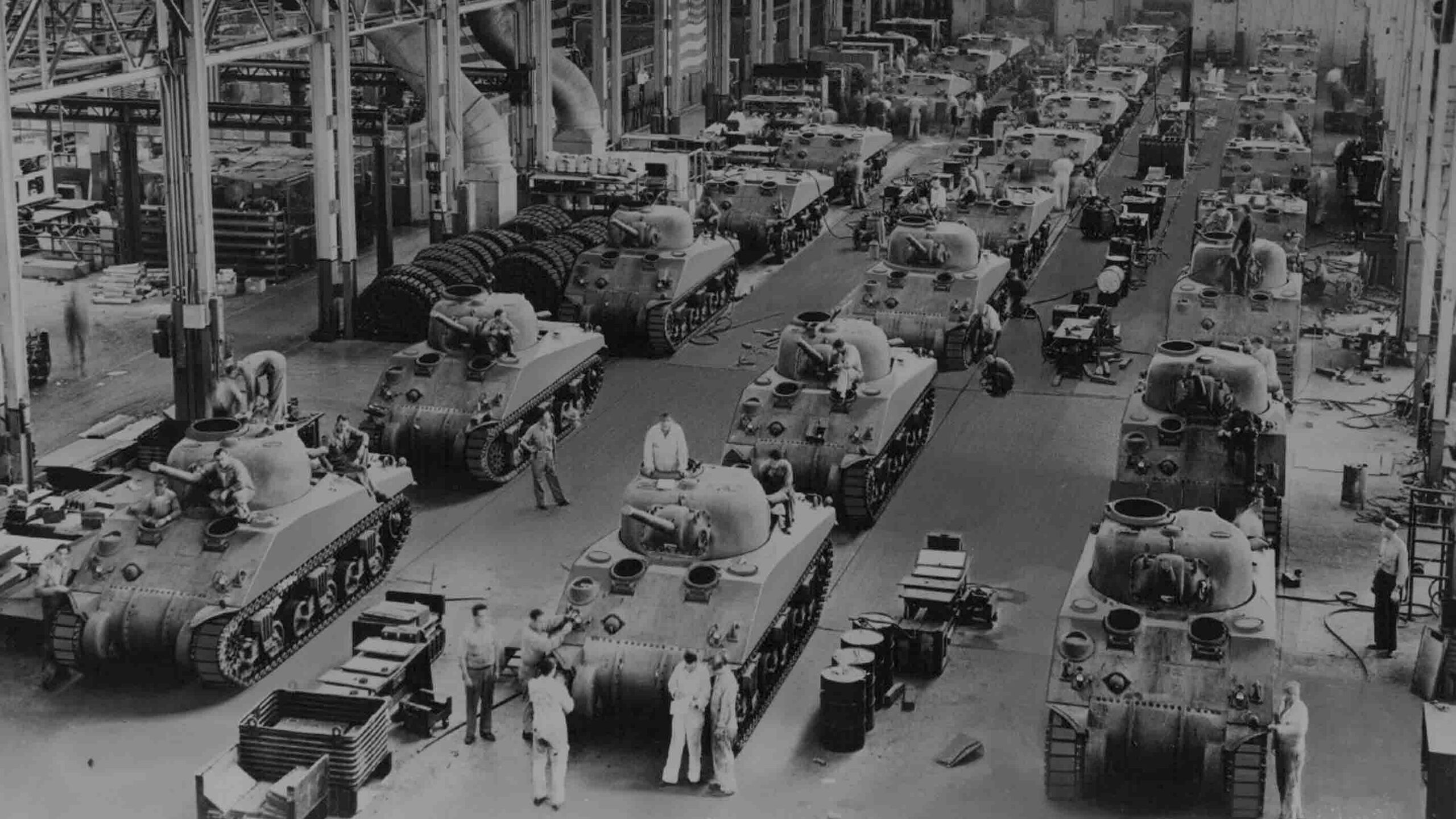 Production of M4A4 Sherman tanks at the Detroit Arsenal Tank Plant, Warren, MI, in 1942. This facility, established under contract with Chrysler, became a key part of the "Arsenal of Democracy," supporting U.S. Army engineering and wartime manufacturing.